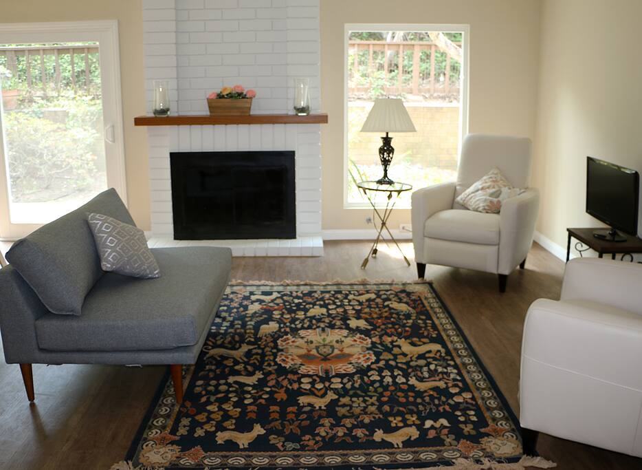 Living room space with views to the trees.