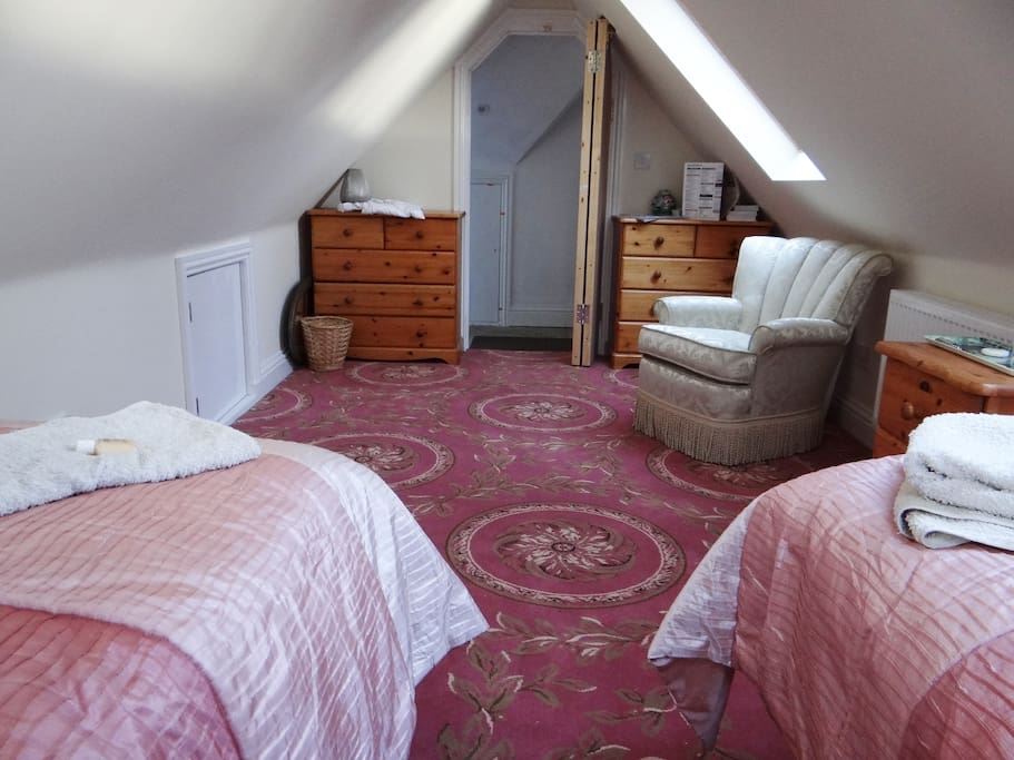 Loft suite is brand new and modern. The bedroom is bright and airy it is a large comfortable room with sloping ceilings from a central height of 7ft.