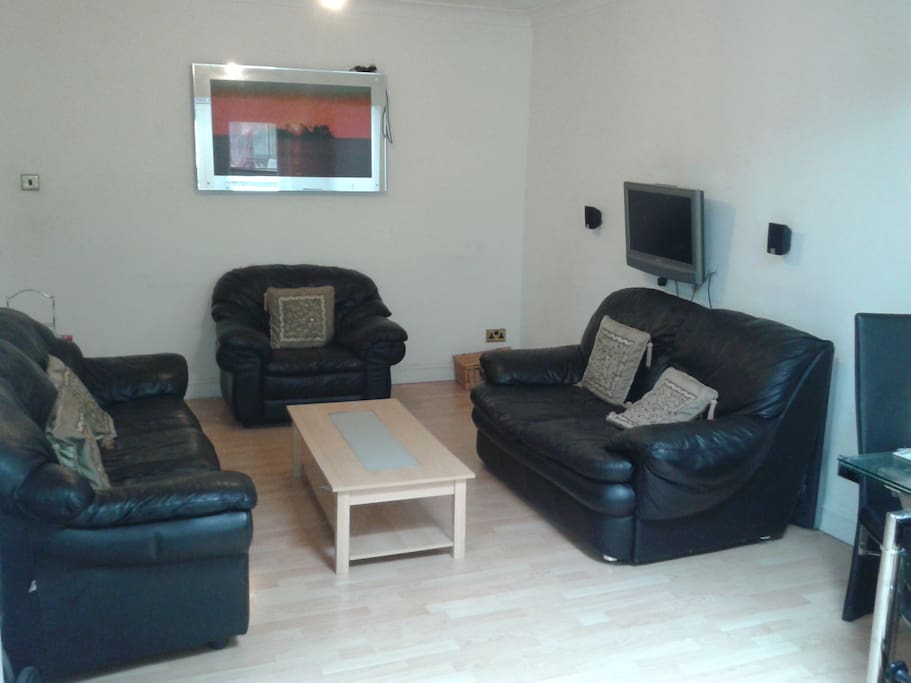 Spacious Lounge Area with TV