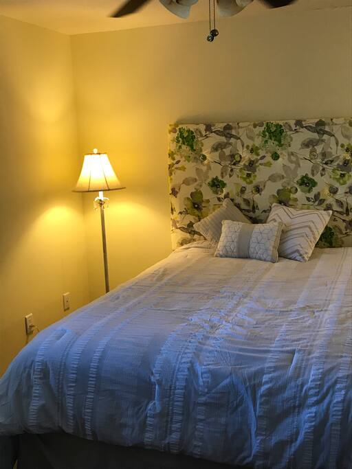 Queen bed with shared bath