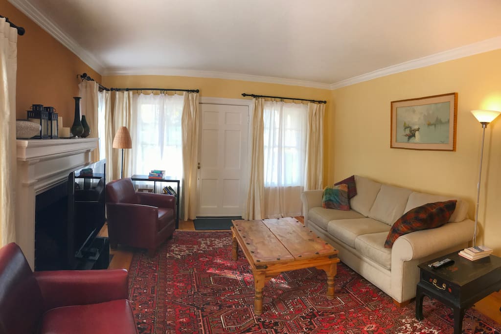 Living room with shoe stacker (older photo at top was taken before shoe stacker, pottery, etc. added)