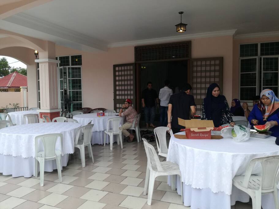 Front of house with 5 round tables