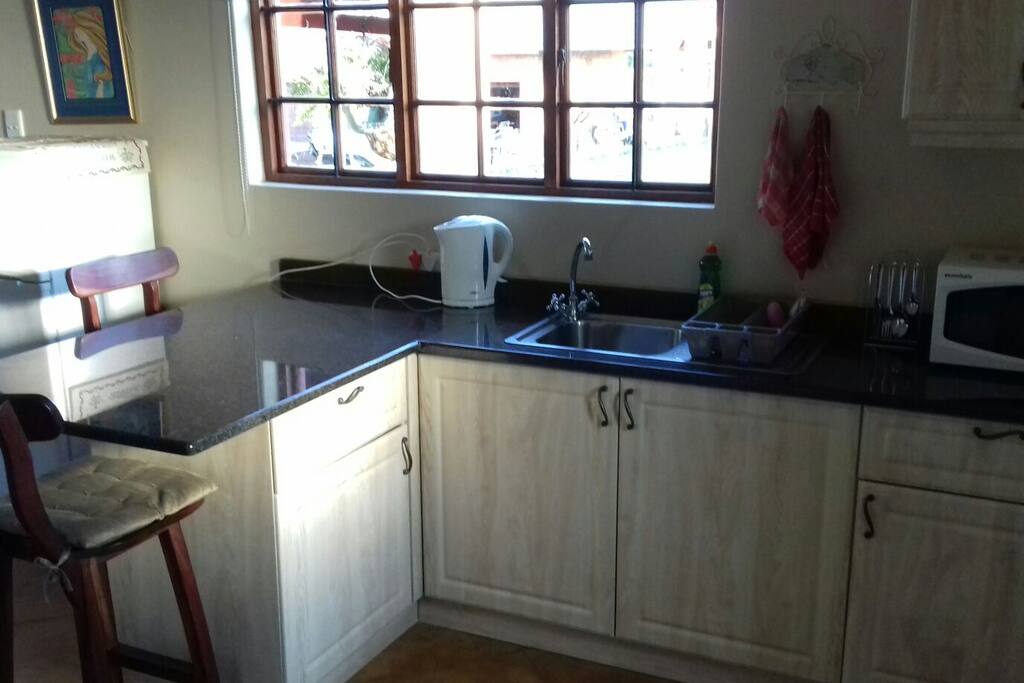 Kitchen, kettle, microwave, toaster, electric frying pan, thermal oven & fridge