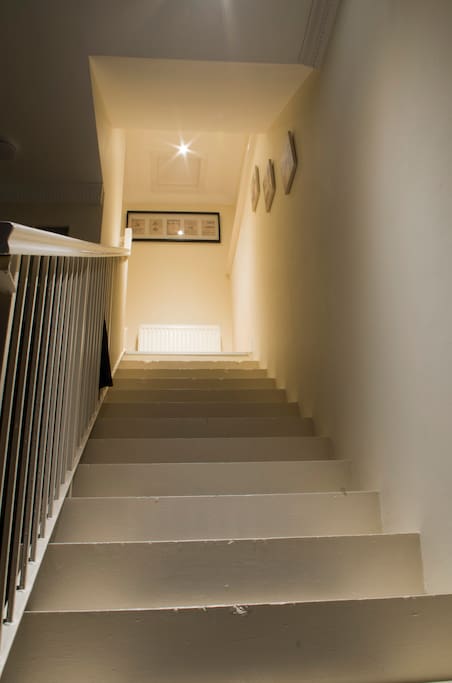 Stairs from the lounge to the bedroom