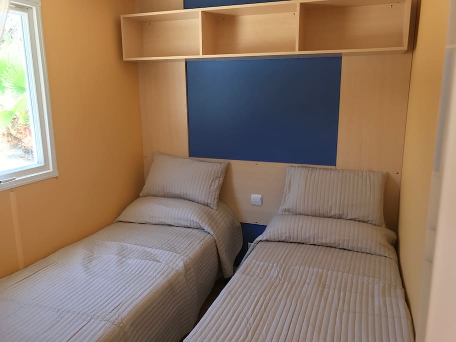 2 single beds and wardrobe