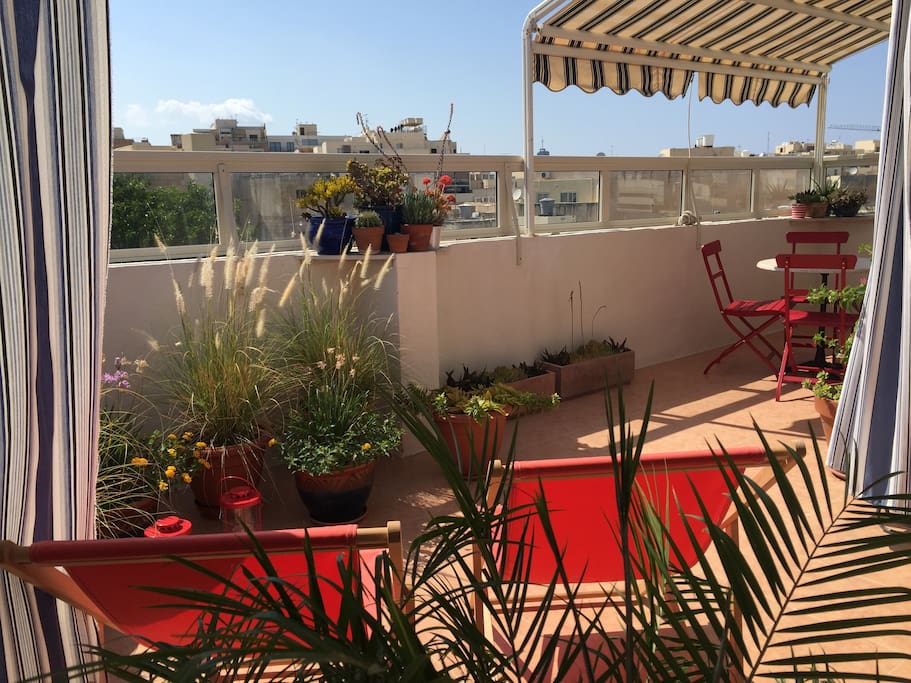 The spacious terrace has sun chairs, bistro table and awning to allow you to enjoy sunbathing and al fresco dining even in the hottest days