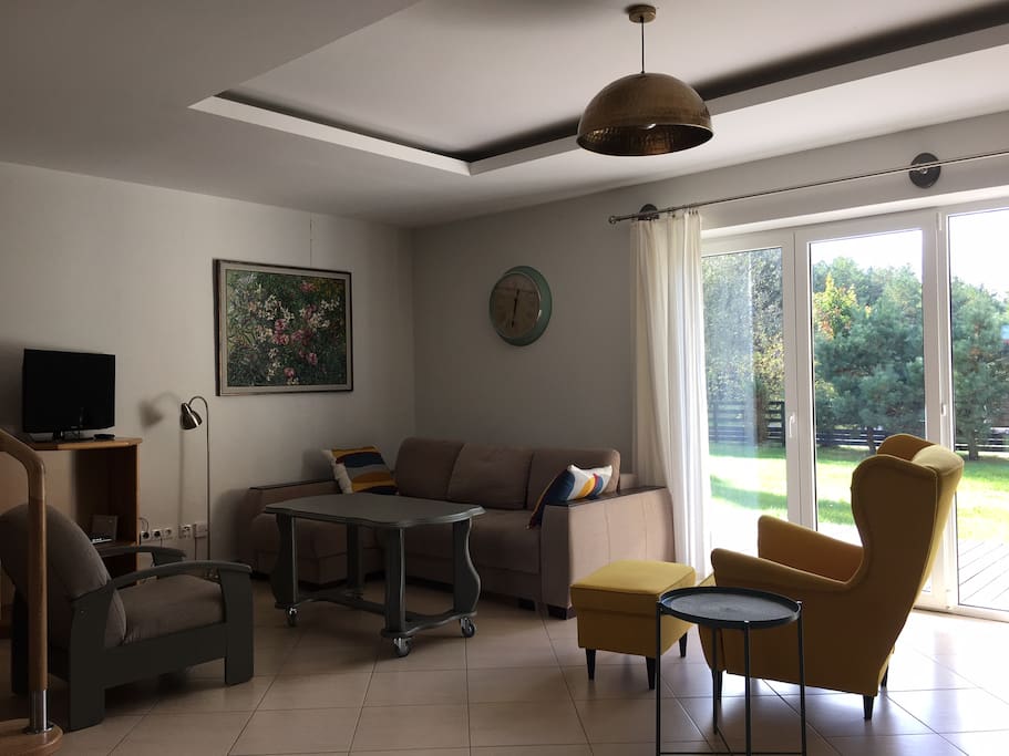 The first floor - living room, TV and the exit to big terrace with barbecue