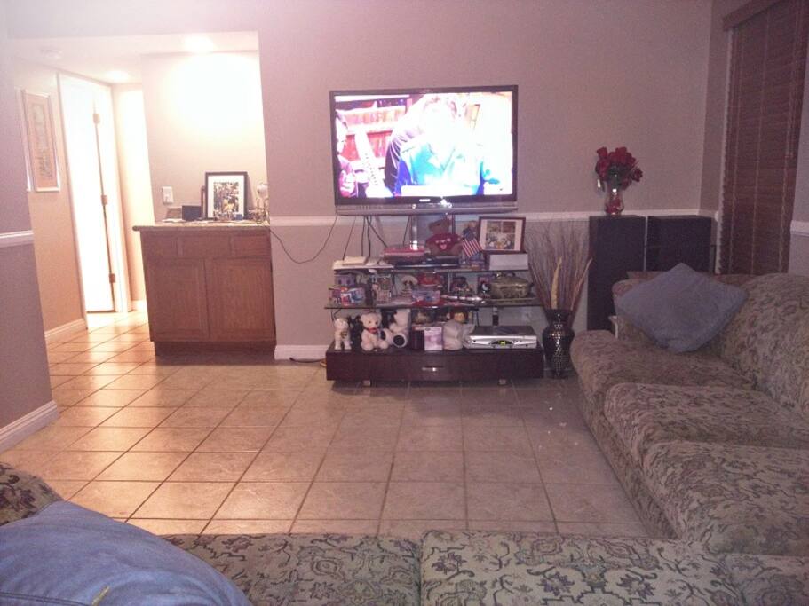 Family room has TV with cable and Amazon TV.