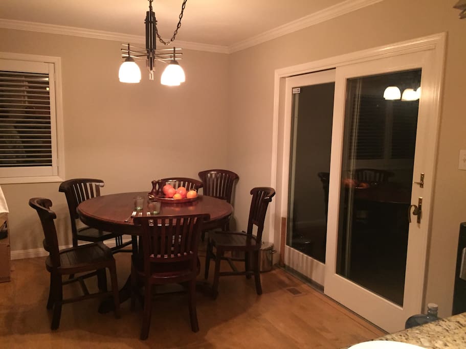 Dining room - recycled teak wood table seats many
