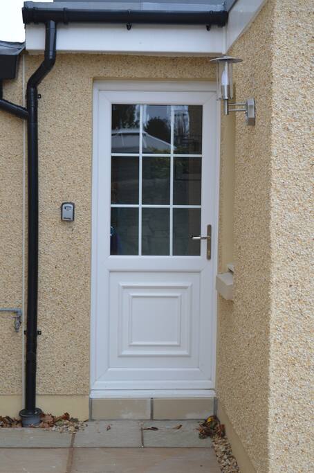 Front door to the apartment. This is located behind the owners house, and is adjoining but a totally separate private space.