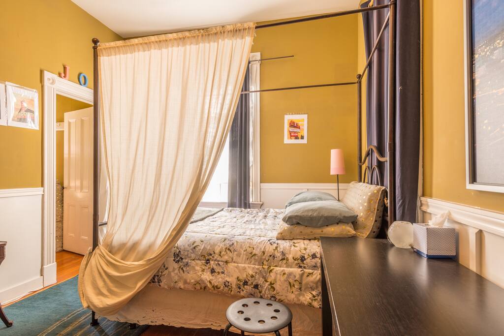 Bed D (full size, with curtains). Closet has storage space and a small fridge.