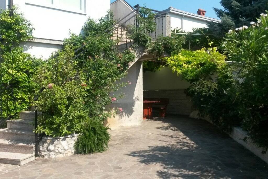 In front of the house