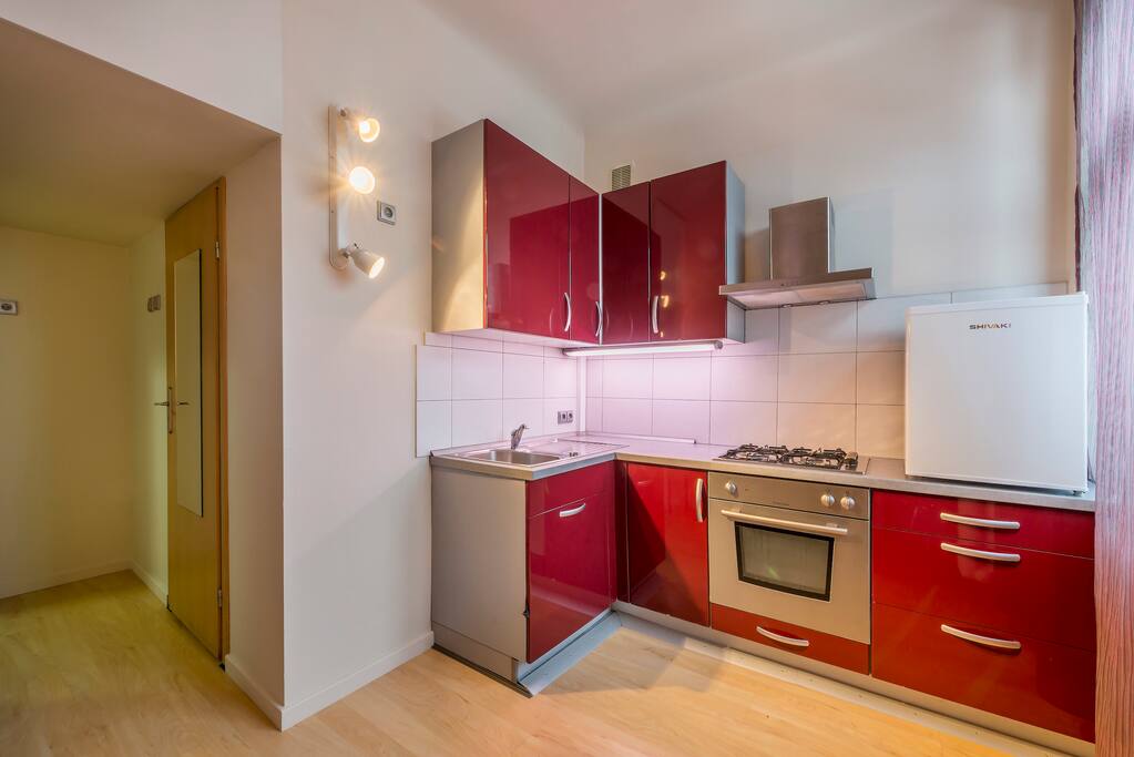 Spatious kitchen with nice sit down area