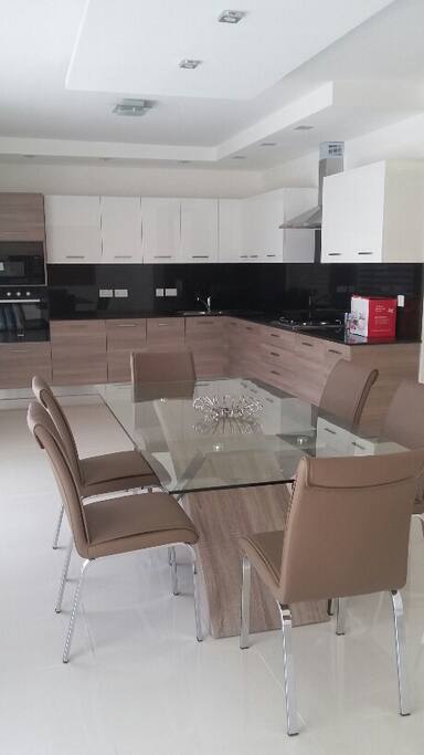 modern, high end finish kitchen/dining area