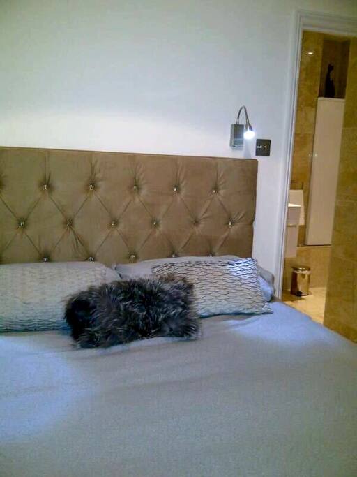 Bedroom with Double bed and Sealy mattress.