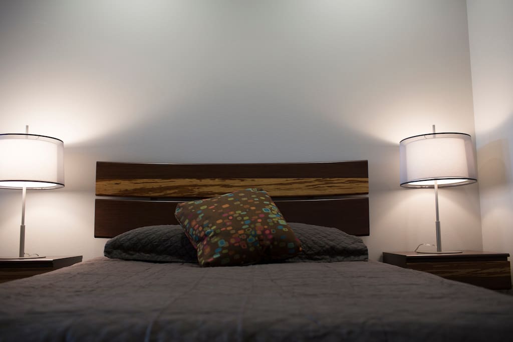Queen Bed with new organic mattress and high thread count linens
