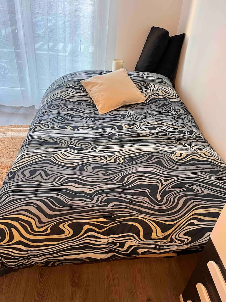 Sofá convertible versión cama de 2 plazas