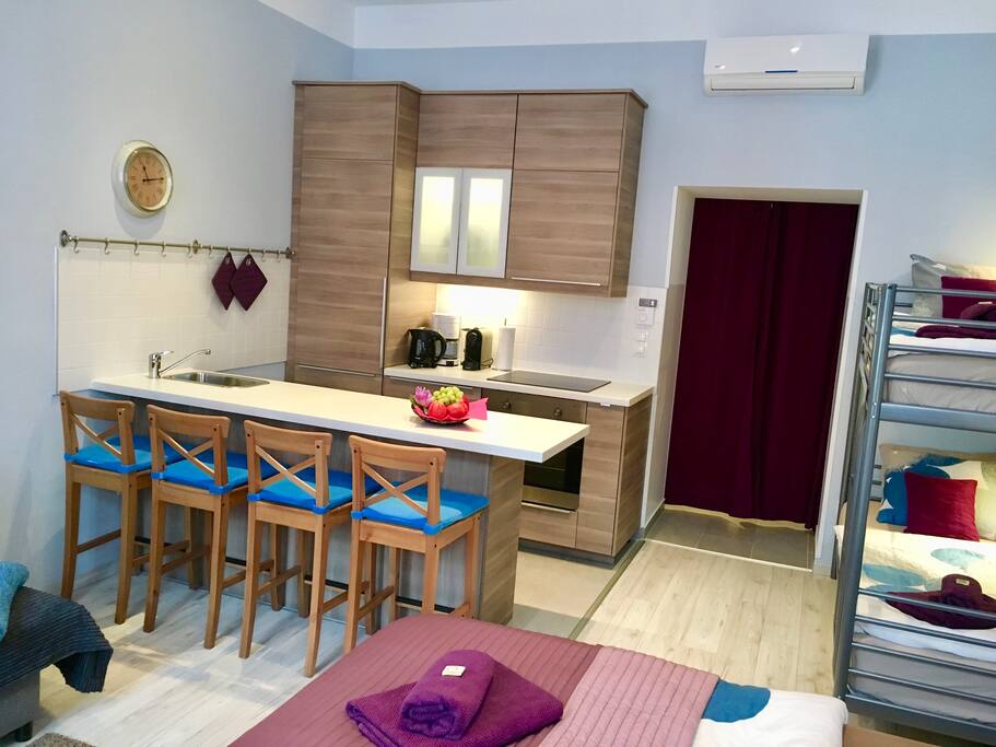 Curtains separate the room from the hallway so that the hallway can be used for privacy while getting dressed etc.
