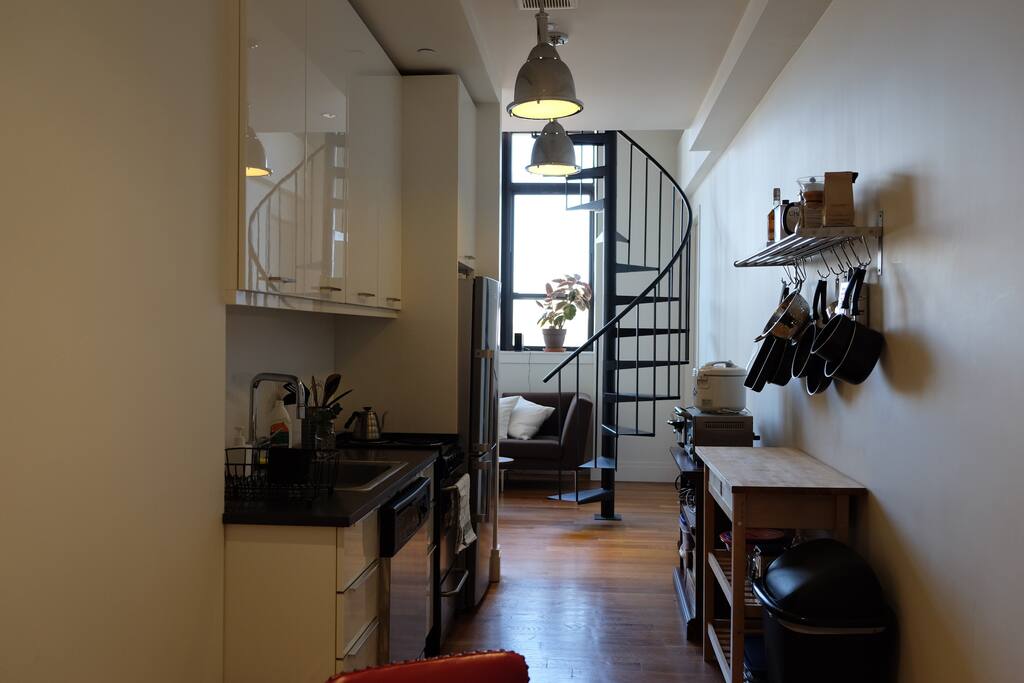 The kitchen leading into the living room