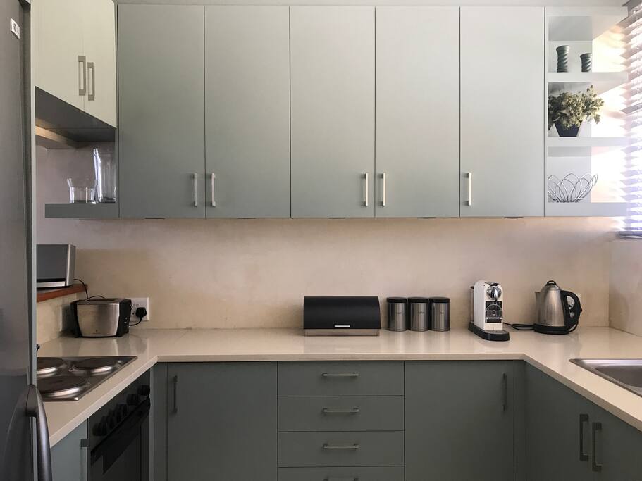 Well equipped kitchen with washing machine