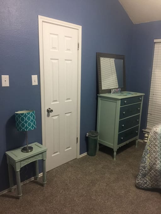 This is the blue bedroom. Closet and dresser available to use. Room can sleep up to 4 adults and one small child.