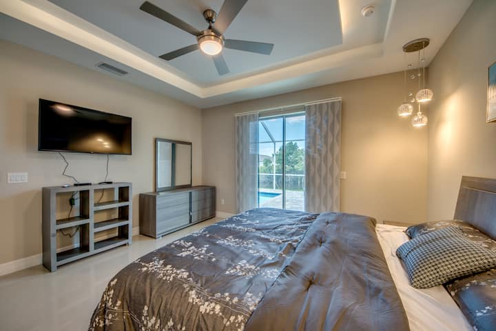 Master Bedroom with King Size bed and 50" Smart TV