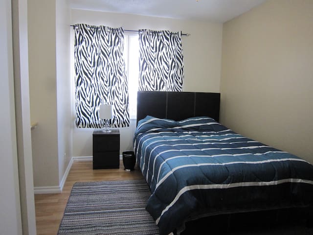 Double Bed With Built-In Shelf set up as desktop.