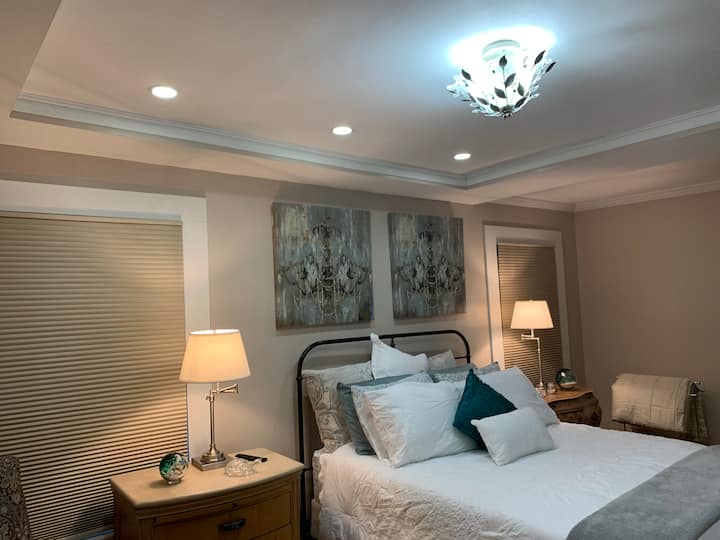 The Pelican:
The Pelican is a charming ensuite for two with a queen size bed. This room also has ample storage to include a small closet for guest use.  The adjoining restroom also has a storage area. 