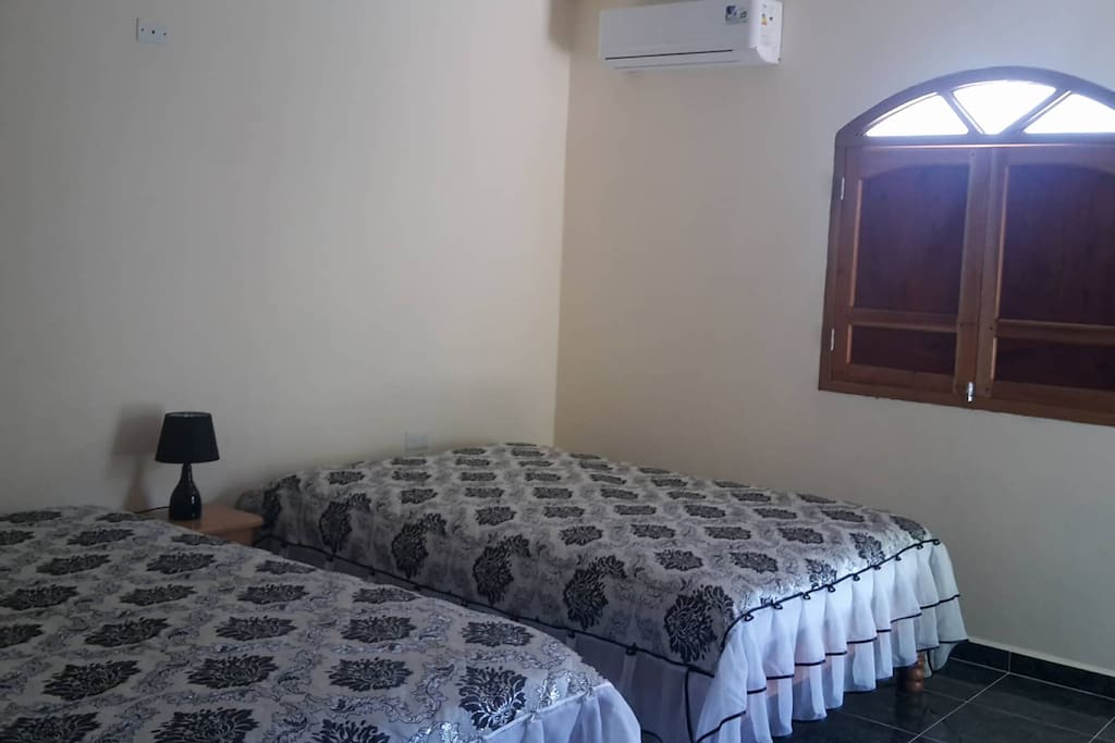 The bedroom, equipped with AC