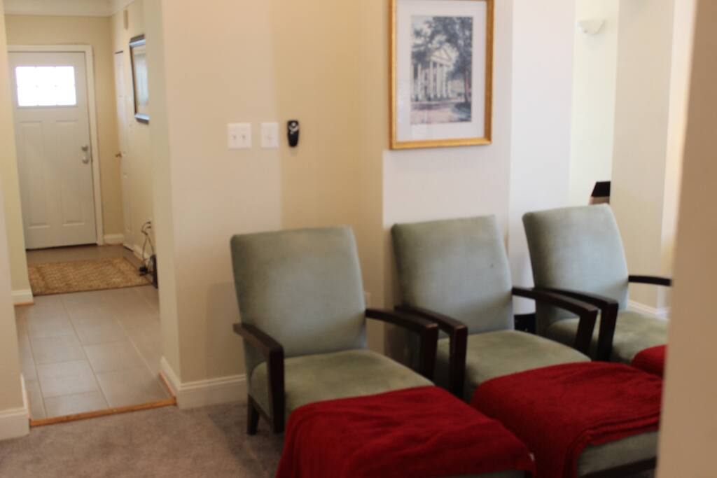 Partial view of the Living Room Area with plenty of seats as well as two sofa beds