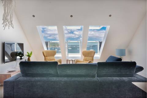 On the Beach! Designer Apartment with garage!