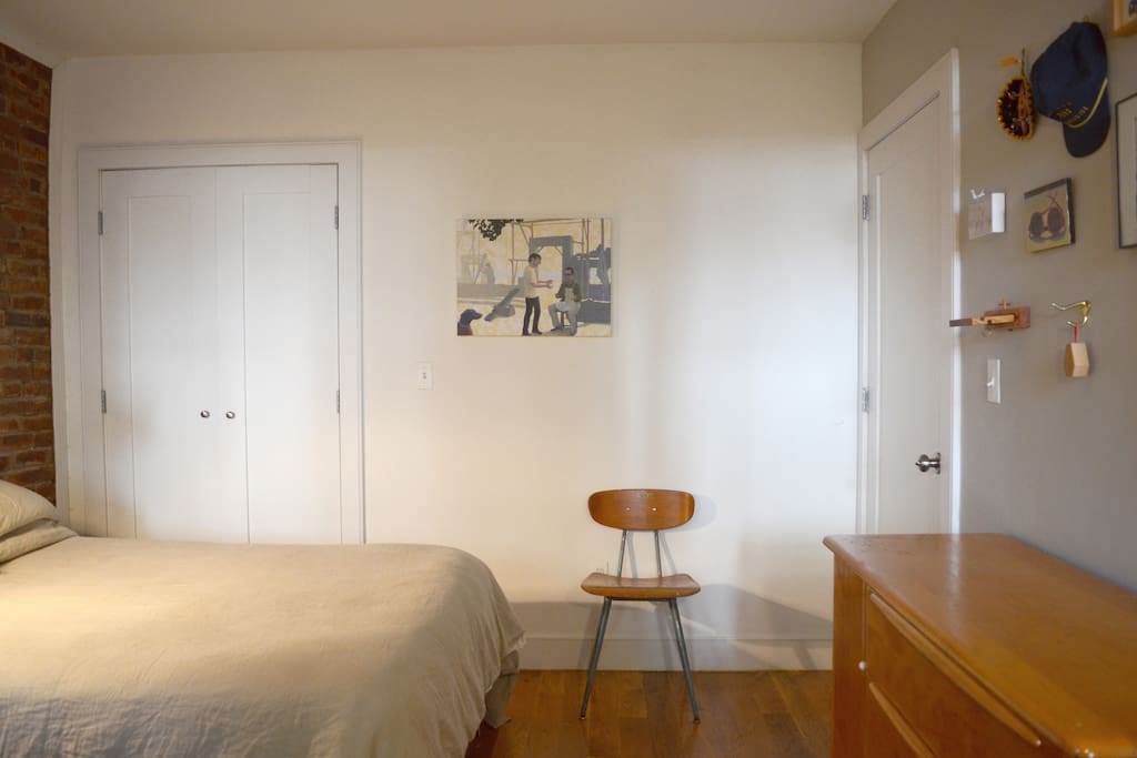 There's a walk-in closet behind those doors to the left — and a steamer!