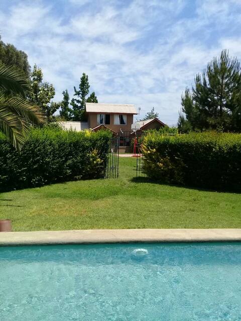 House with beautiful garden and pool.