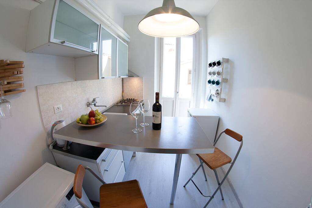 Kitchen with high table/stools