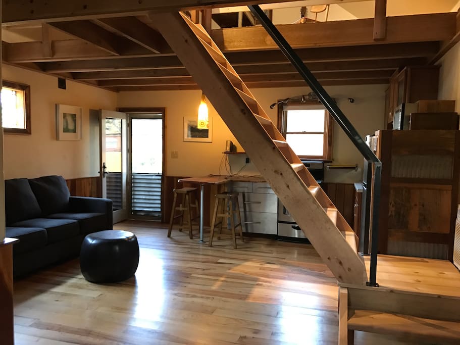 Stairs up to the bedroom and additional seating (relaxing) space
