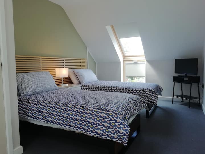 Twin bedroom which can be made into a super king bed also a dressing area and TV 