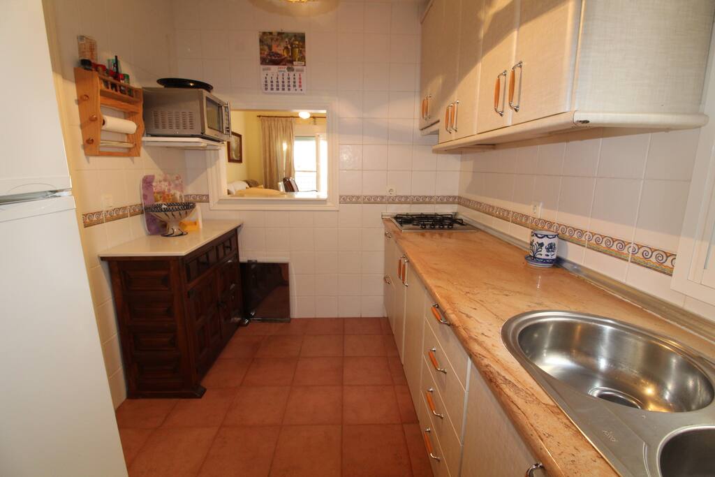 Cocina con mostrador al salón