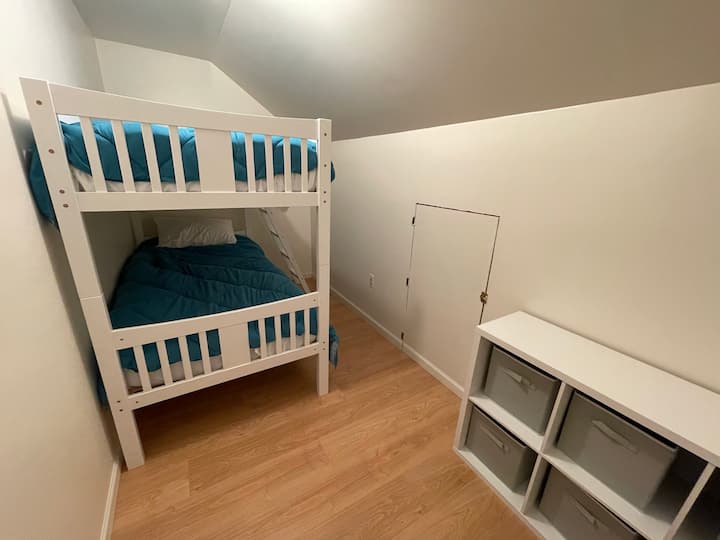Twin bunk beds provide a fun space to enjoy 