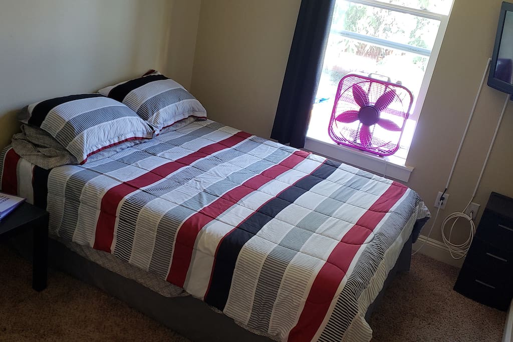Hybrid Room is 8' x 12' and features air conditioning, high-speed wi-fi, Amazon FireTV, and a north-facing window that opens wide. The room also has a locking door with your own room key on a purple carabiner.