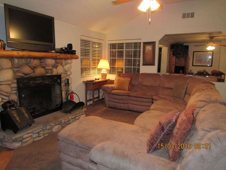 Living Room Couch, Fireplace & TV
