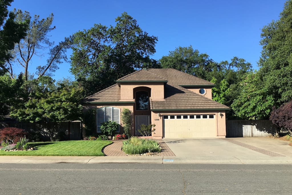 Great off-street parking to the right of the garage with motion sensor camera for your safety.
