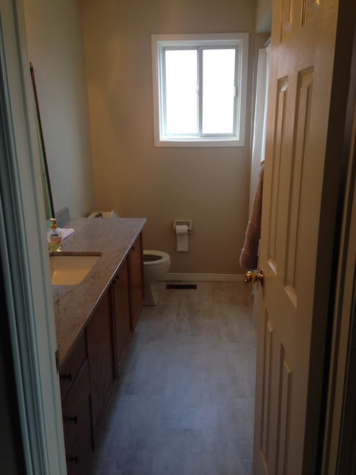 Shared bathroom with shower/ tub