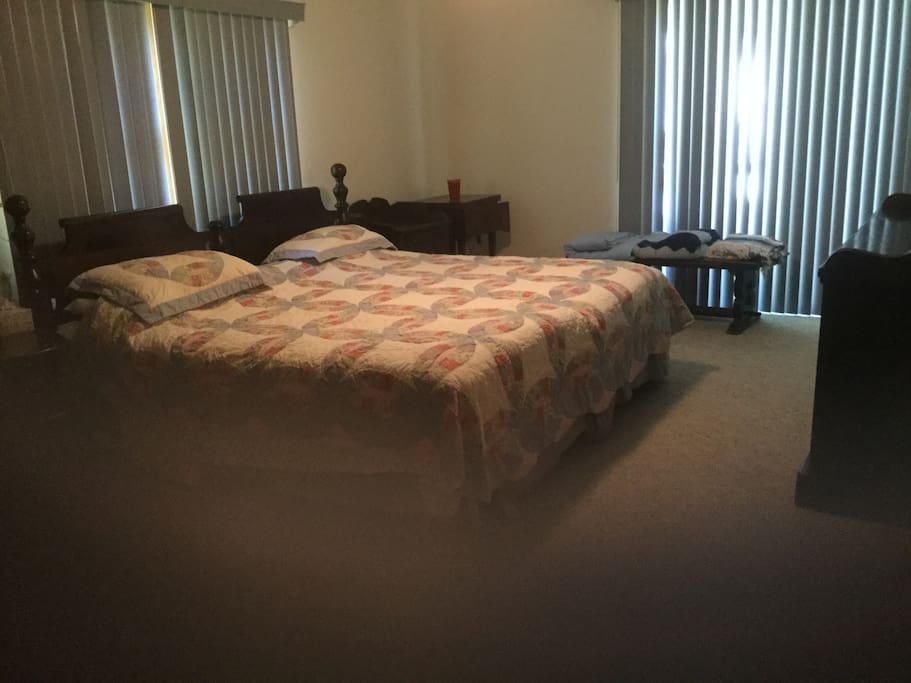 Large bedroom - king headboard - twin mattresses.