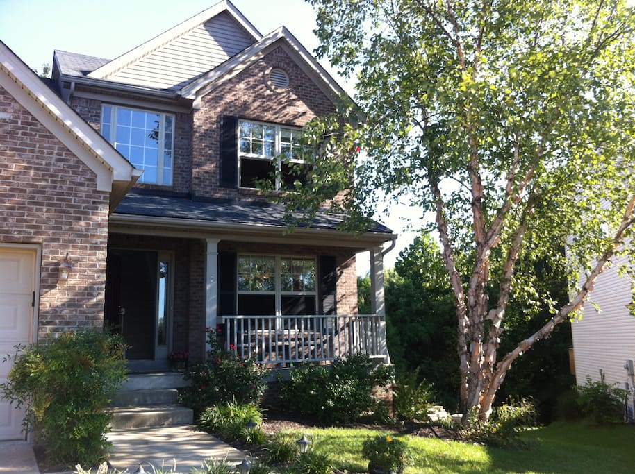 Front porch is a pleasant sitting spot.