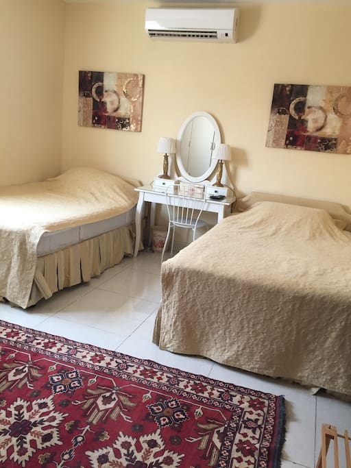 Two beds each 120 cm with fresh terry and a bed cover matching the decor of the room