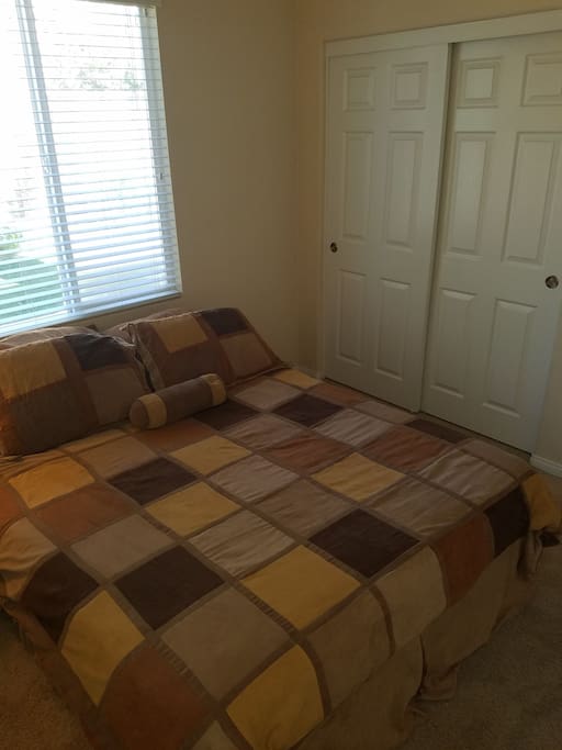Bedroom with full closet.