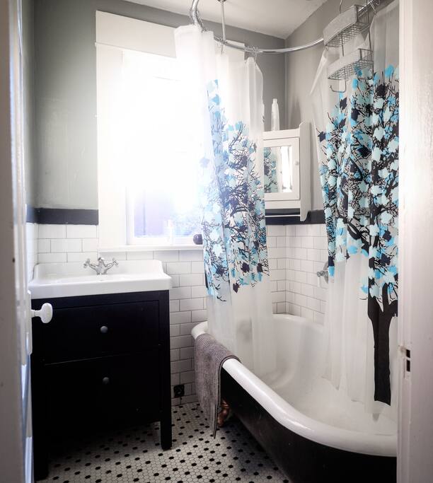 clawfoot tub and rainshower, oldstyle separate bathroom