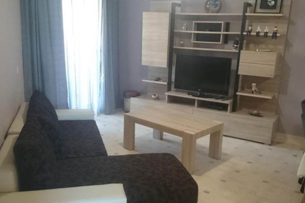 Zona giorno, divano letto, tv