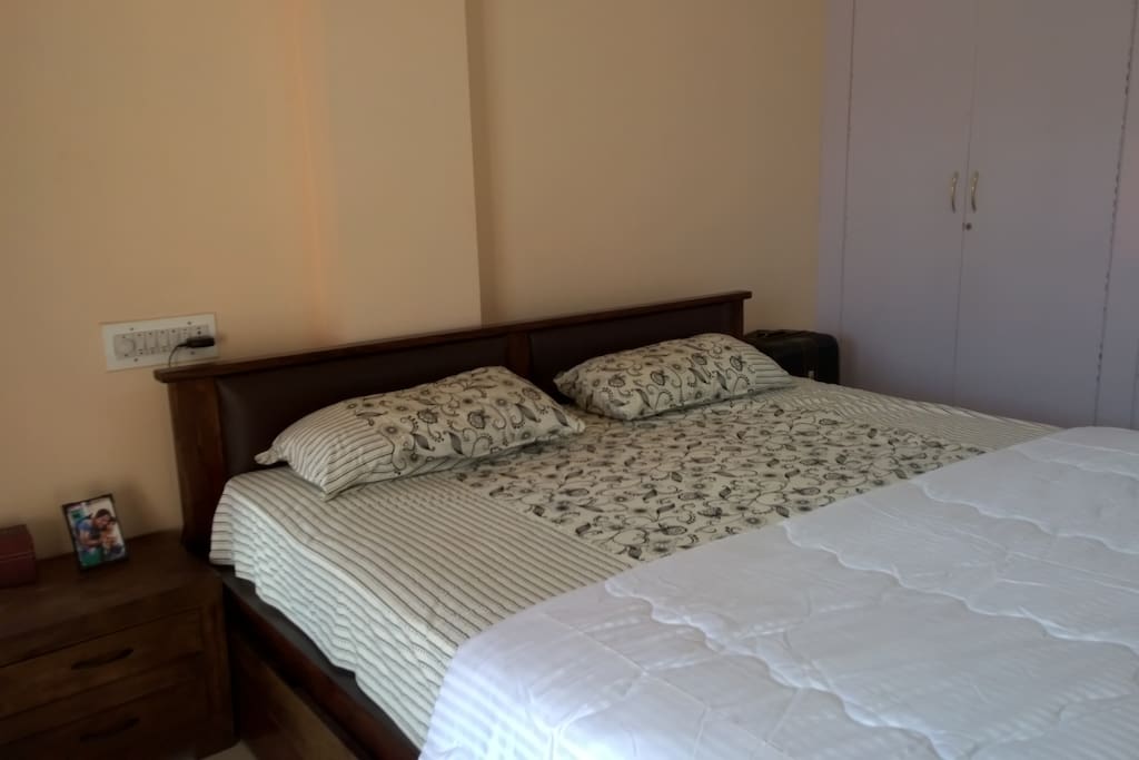 Bed with side table