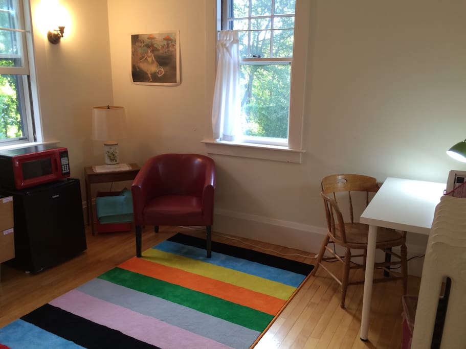 Bright sitting area with lots of windows.
